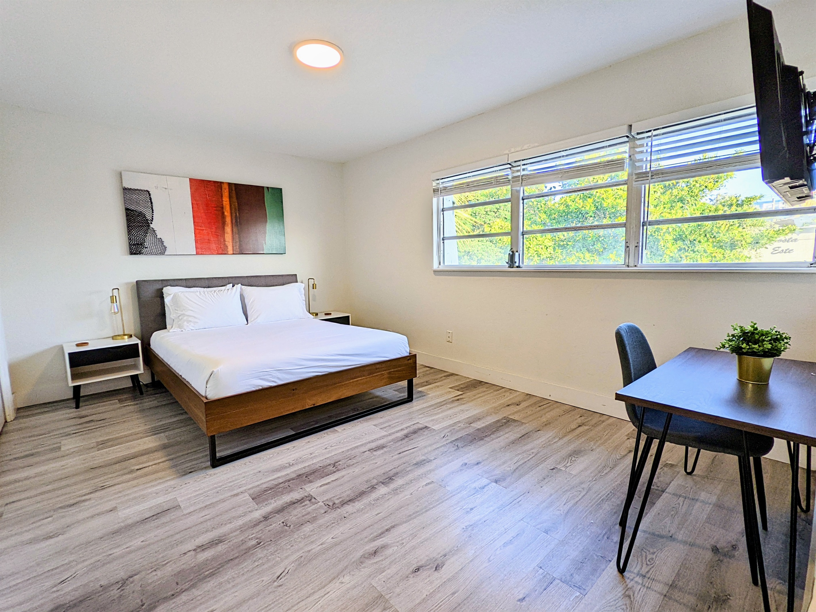 This is your bright Pier Walk master bedroom, located on Deerfield Beach Island!