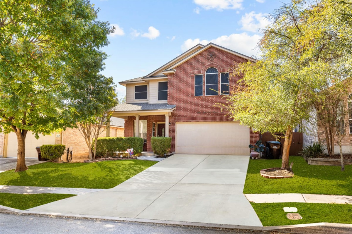 Beautiful curb appeal with brick detailing, secure entry, and easy access to the best of San Antonio—just 4 miles to SeaWorld and 18 minutes to downtown.