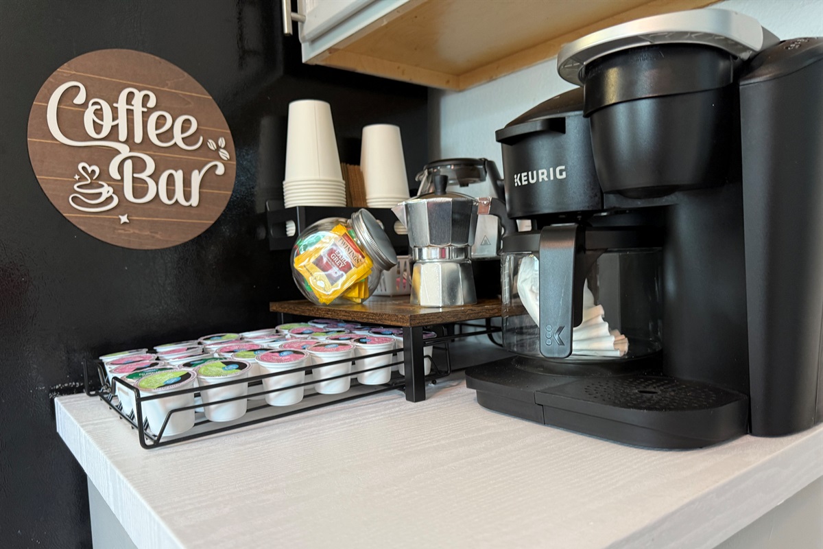 ☕✨ Fuel your day at our fully stocked coffee bar – Keurig, espresso, full pot, decaf, tea, sweeteners, cups & lids all ready to go! 🌟