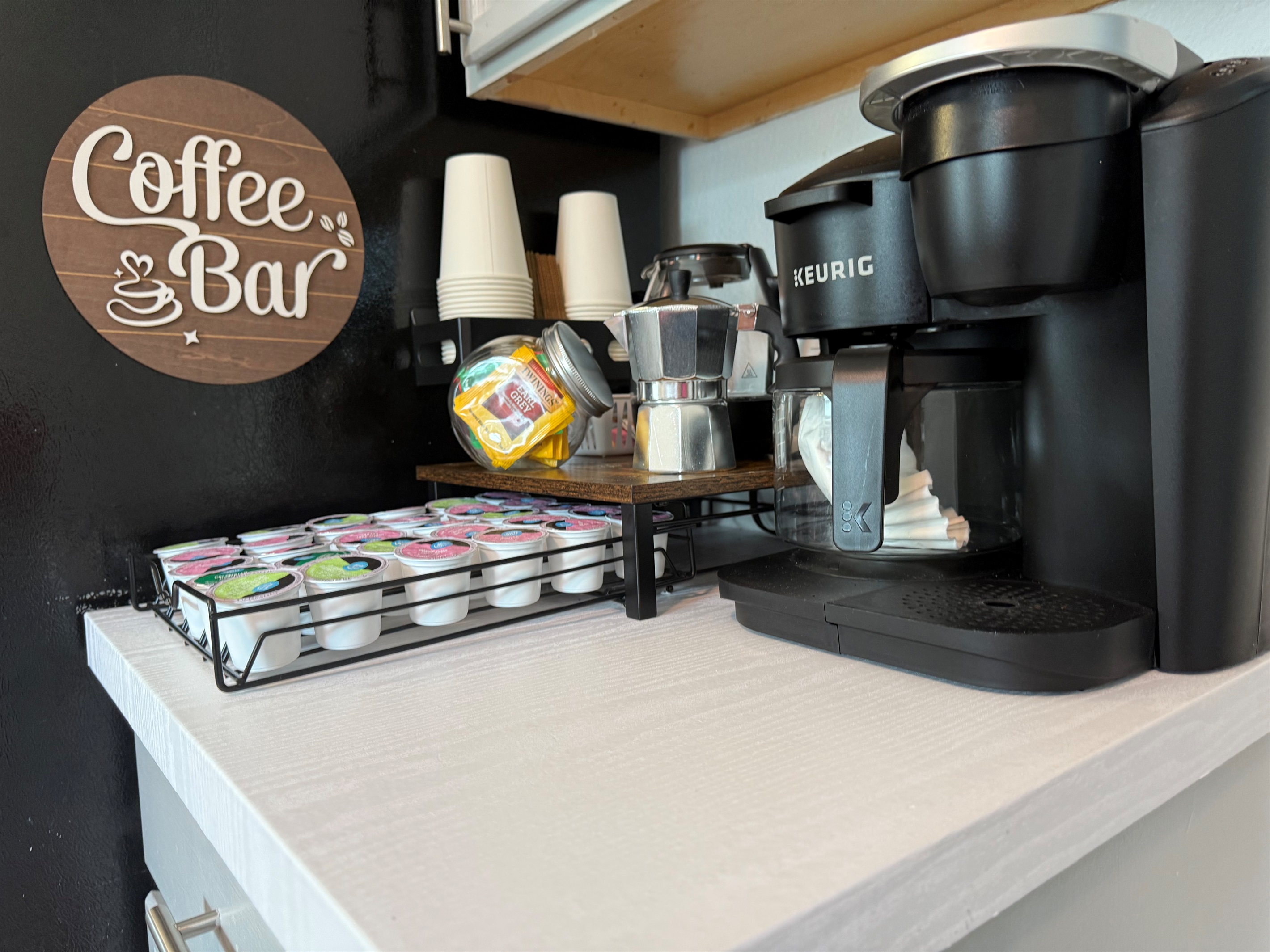 ☕✨ Fuel your day at our fully stocked coffee bar – Keurig, espresso, full pot, decaf, tea, sweeteners, cups & lids all ready to go! 🌟