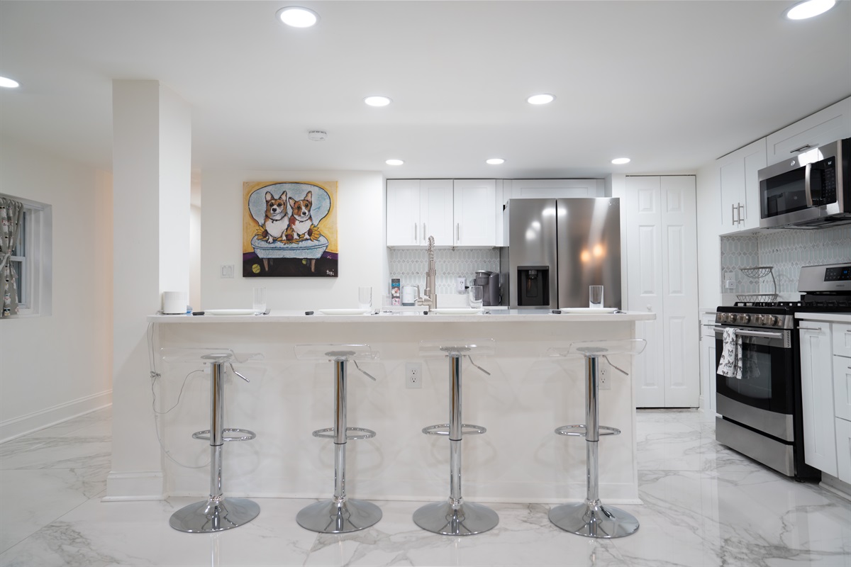 Up to 4 people can sit at the kitchen island in the lower level