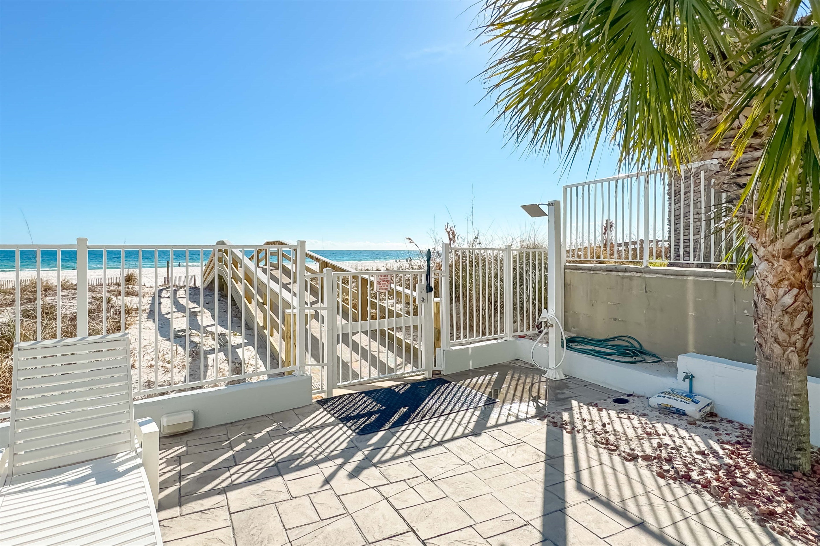 Where the pool meets the ocean.  Enjoy a seamless blend of relaxation and recreation in this idyllic beachfront setting.