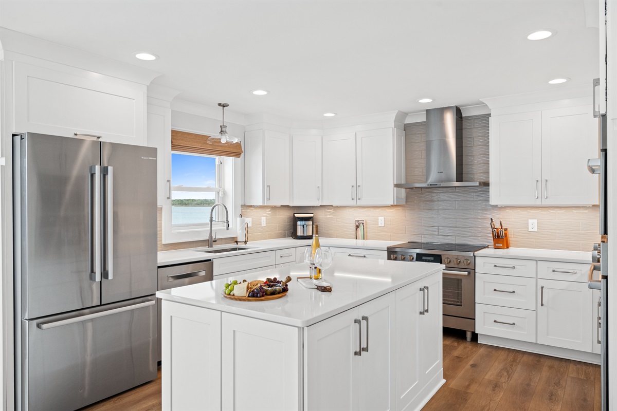 Spacious gourmet kitchen designed for effortless cooking with plenty of prep space and modern stainless appliances