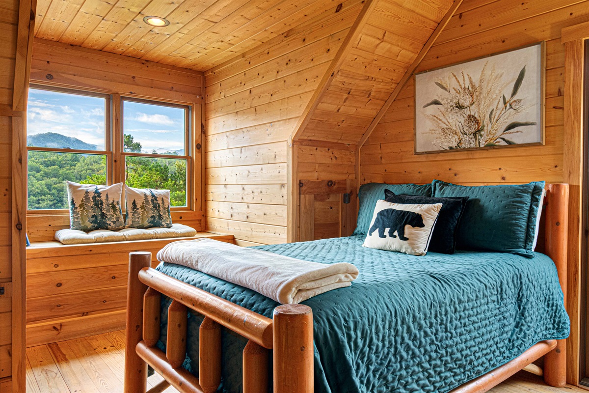 Upstairs Bedroom 1: Wake up to stunning mountain views from your rustic retreat!