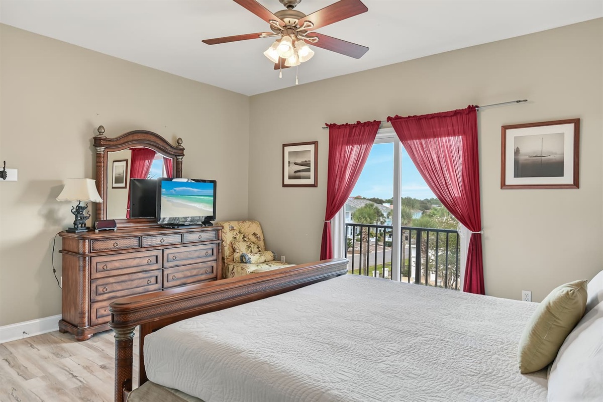 BEDROOM #4 + BATHROOM #4: King Bed with night stands, dresser, and TV. This bedroom has a private ba