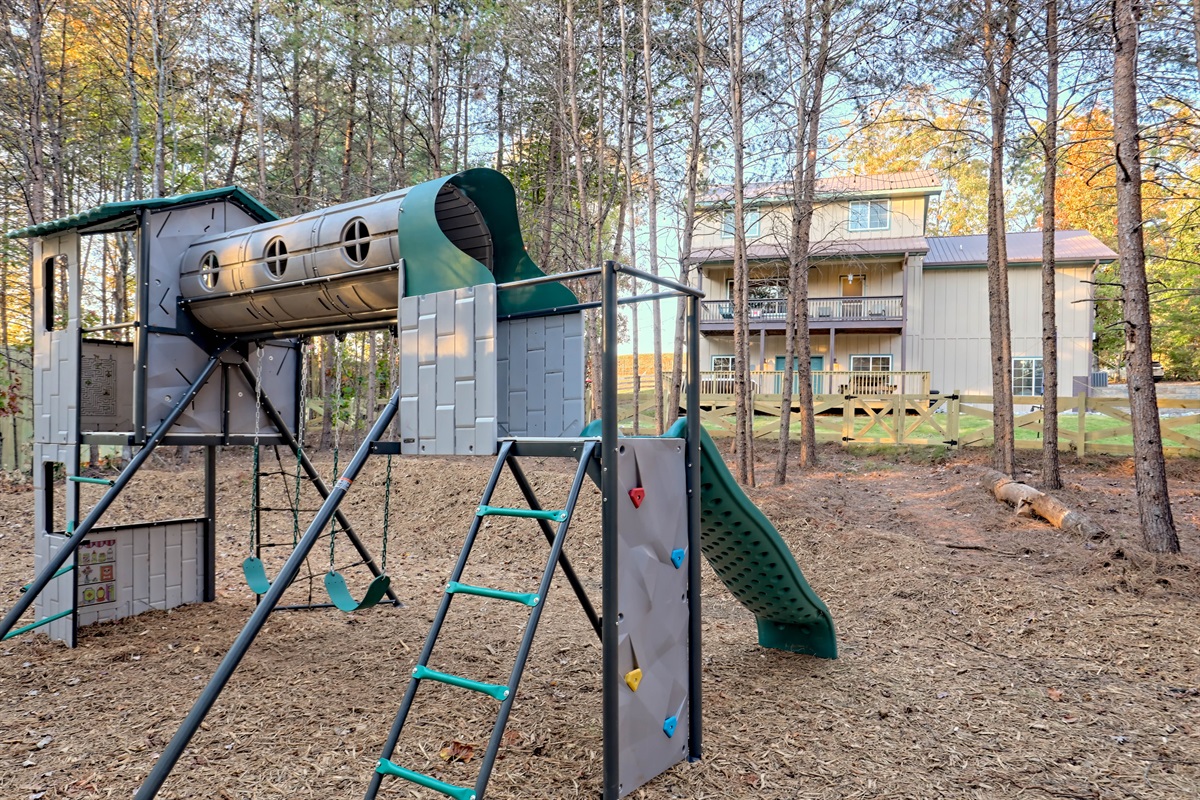 Kids will love the private playground featuring swings, slides, and climbing structures.