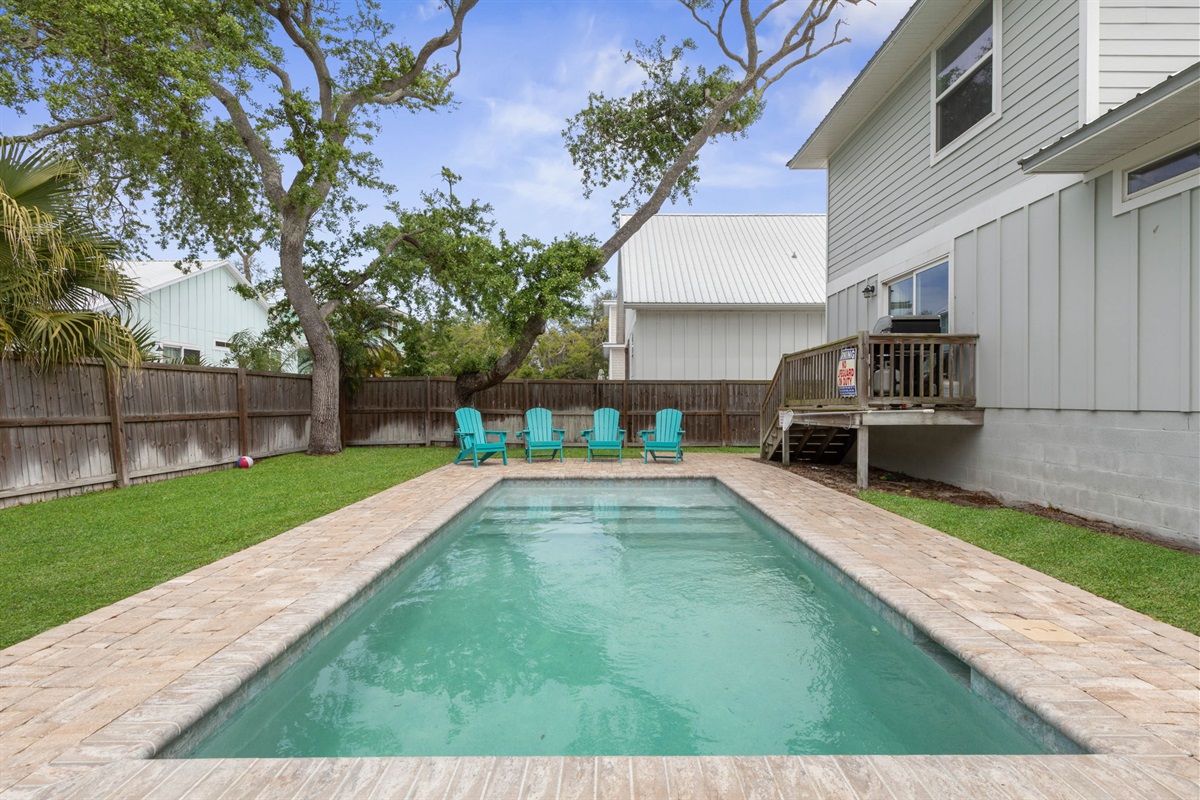 Spend the afternoon splashing in your private pool, claim a turquoise chair as the sun drops low, and let the backyard turn into the kind of easy, laughter-filled vacation memory everyone wishes they could take home.