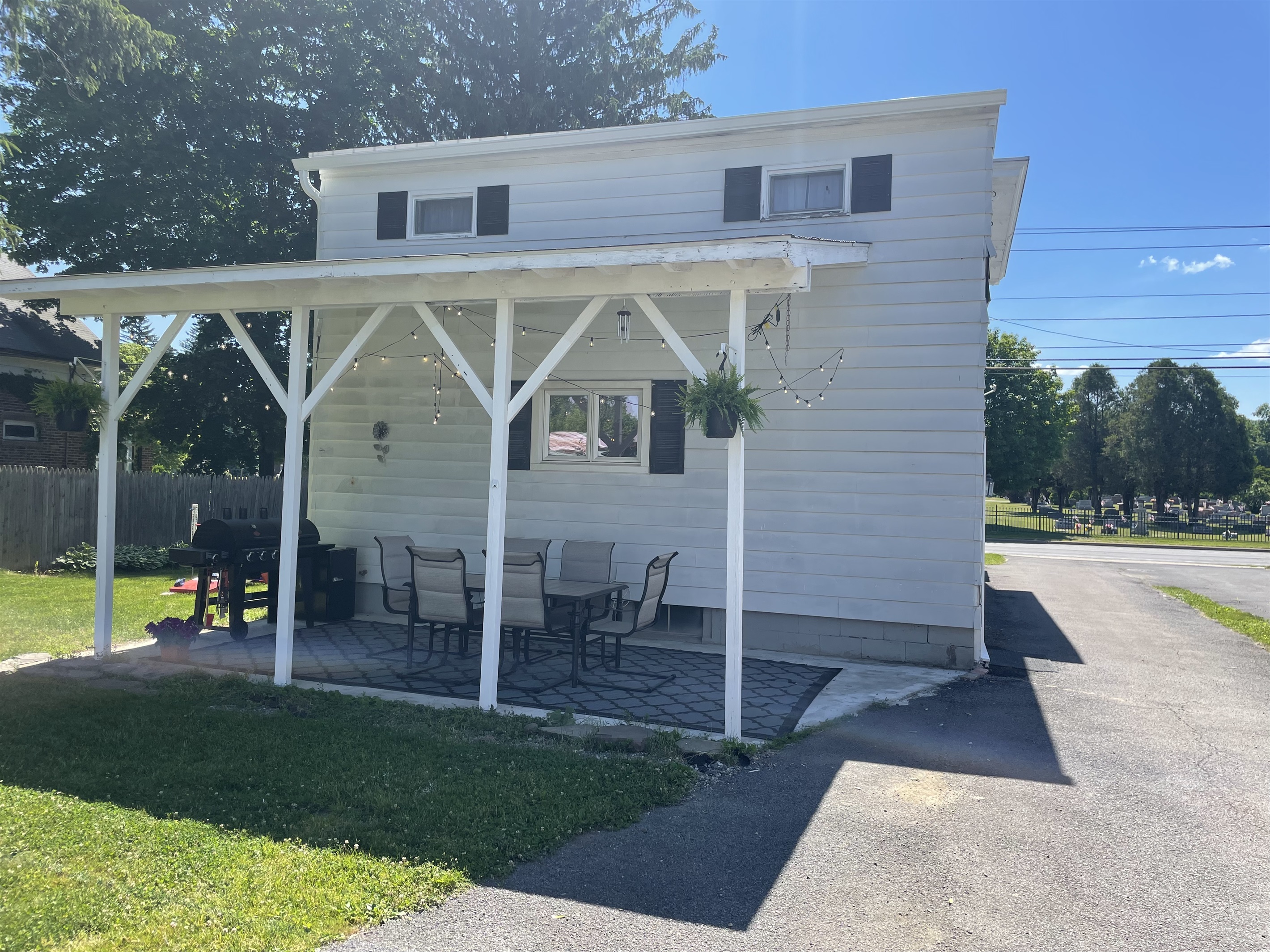 Rear covered patio and driveway