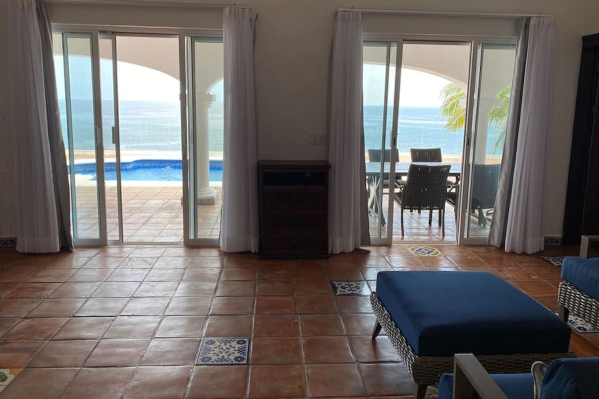Views of the pool and ocean from living room 