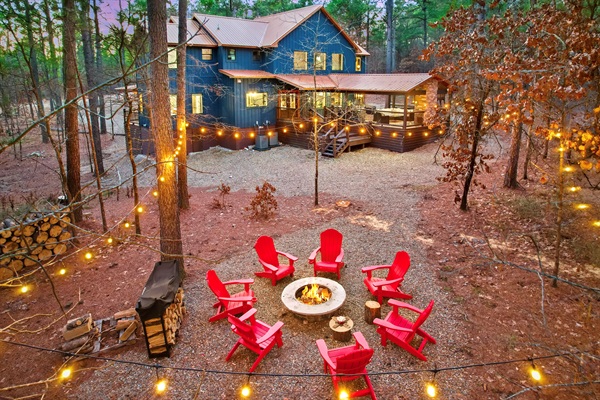 Cozy firepit nights under the string lights — guest favorite!