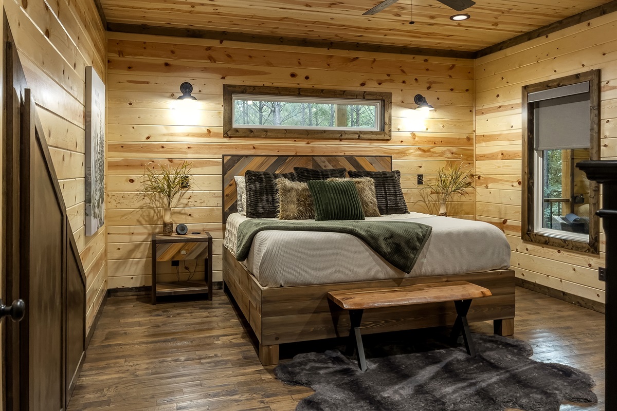 Master suite downstairs provides roller shades so you can sleep in!