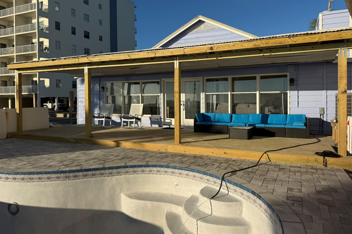 Large Private Deck with Rocking Chairs and Couch Seating.