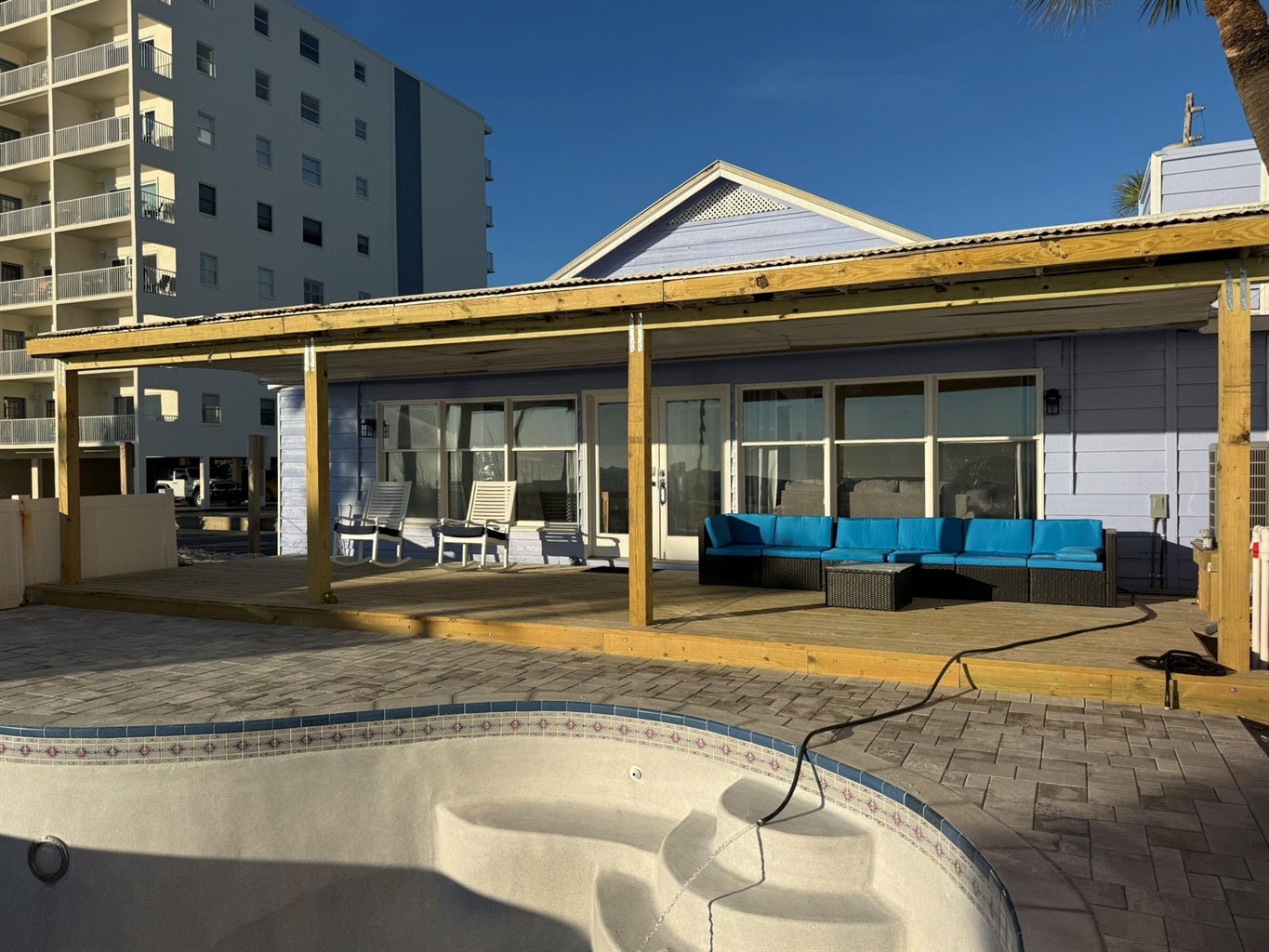 Large Private Deck with Rocking Chairs and Couch Seating.