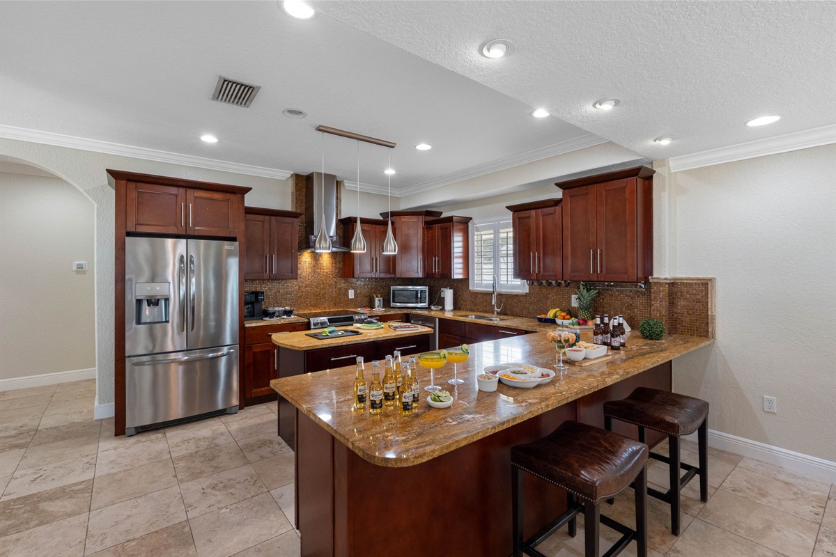 The heart of the home, this fully equipped kitchen is designed to meet all your culinary needs.