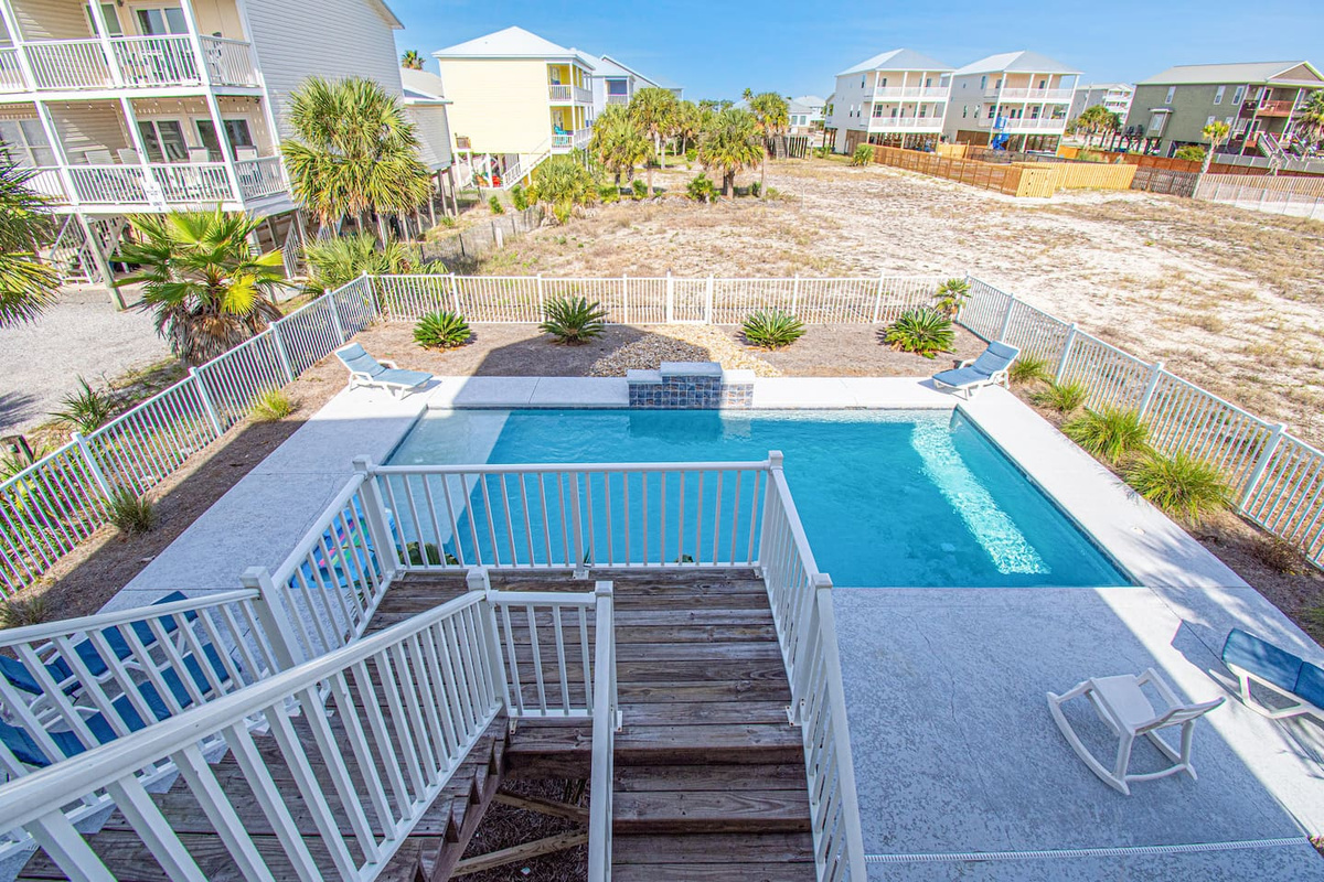 Easy access straight down to the pool from the main level of the house.