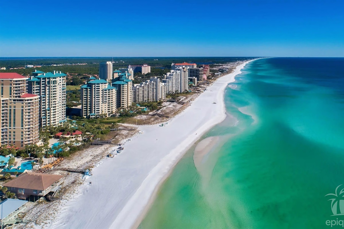 Sandestin beach with white sand and emerald water