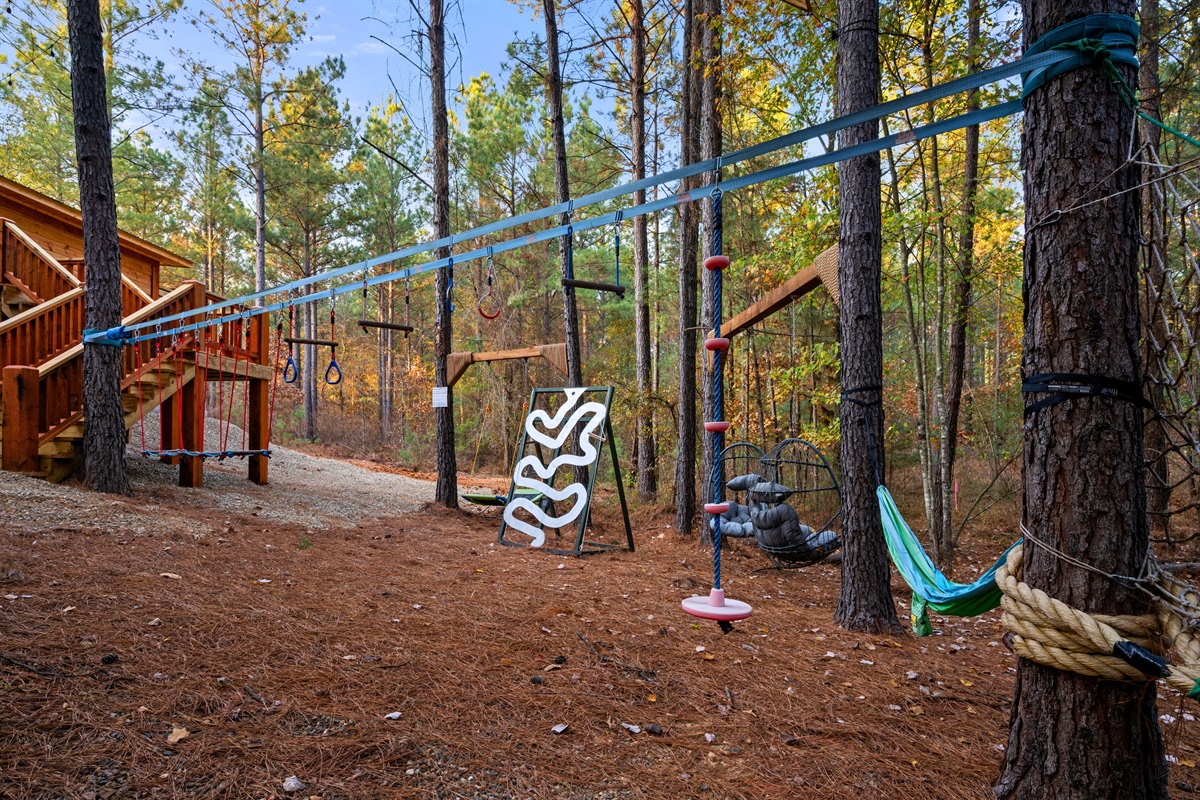 Along this stretch, you’ll find even more balance lines and swings, giving kids plenty of space to test their footing and enjoy a little outdoor adventure.