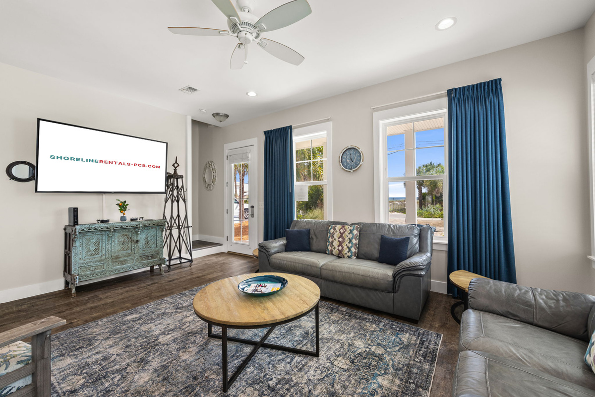 Open concept living area designed for family vacations, movie nights & relaxing after the beach