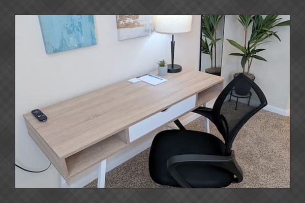 The dedicated workspace has plenty of storage, fast wi-fi, and easy access to electrical outlets.