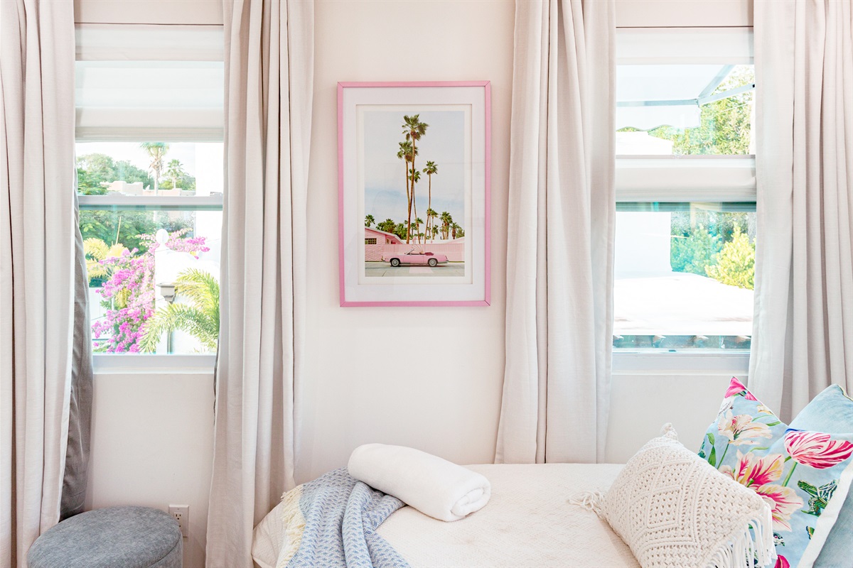 Our first cottage bedroom features two double beds, stylishly designed and very comfortable.