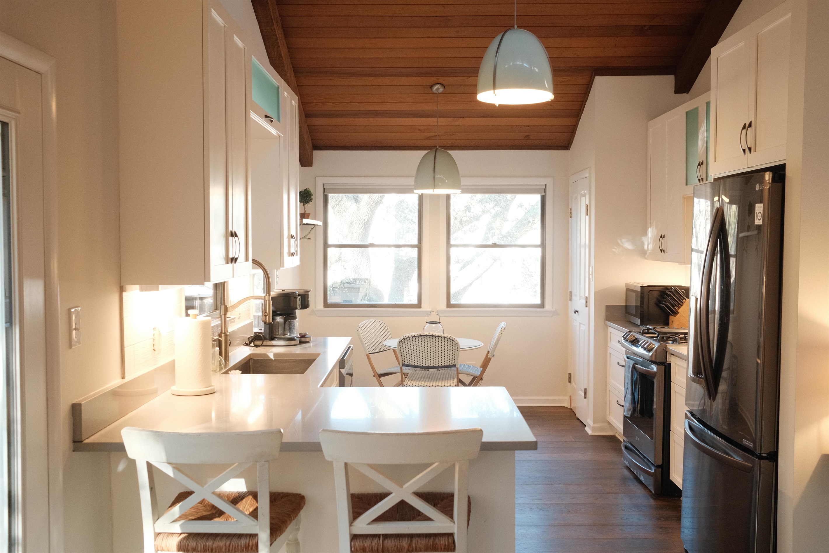 Kitchen with a breakfast nook , opens to the dining room and living area.   