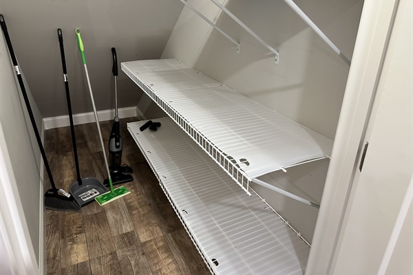 Large pantry with lots of shelving.