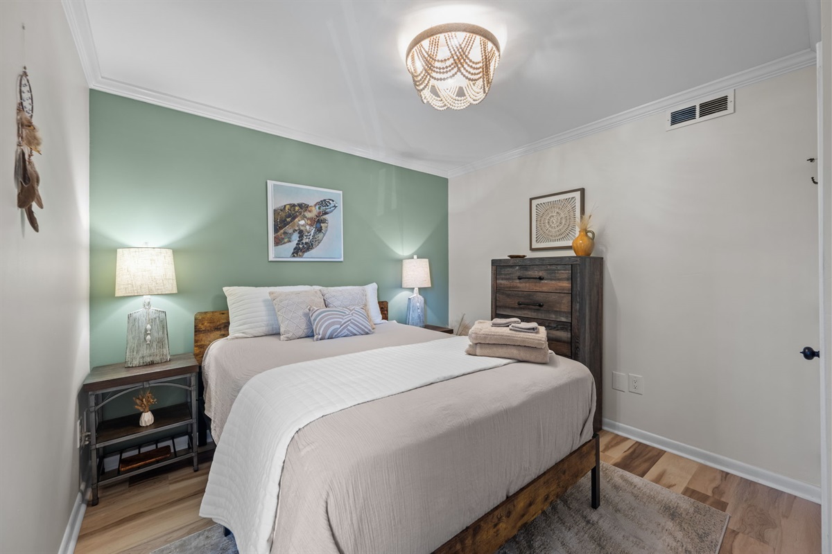 Comfortable queen bed with stylish touches and plenty of storage
