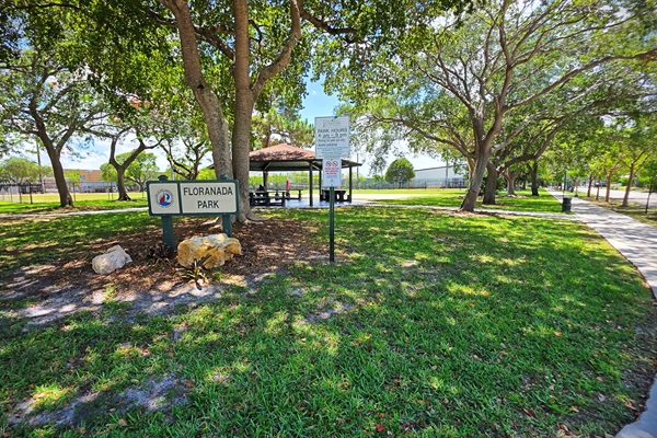Floranada Park across from the home featuring basketball courts, sand volleyball, baseball fields & open green areas