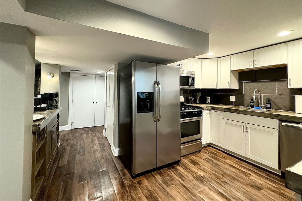 The Garden Level Kitchen includes a pantry and full sized appliances.