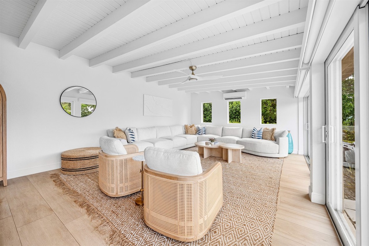 Soft textures and coastal tones create a calming retreat, perfect for gathering, relaxing, or enjoying quiet mornings.
