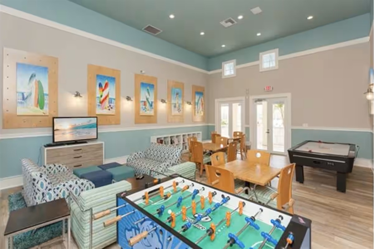 Fun for all ages at the Cinnamon Beach clubhouse 🎉
Enjoy the game room with foosball, air hockey, lounge seating, and space to gather—perfect for rainy days or evening fun after the beach.
