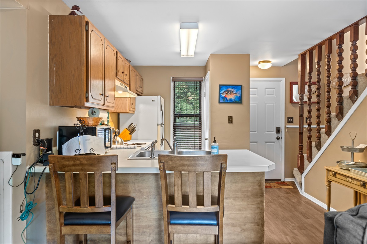 Two bar stools for additional dining seating