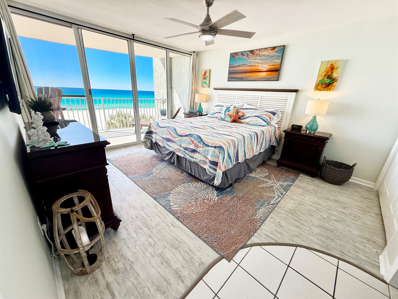 Super comfortable Cal King mattress with beautiful emerald green Gulf front views.