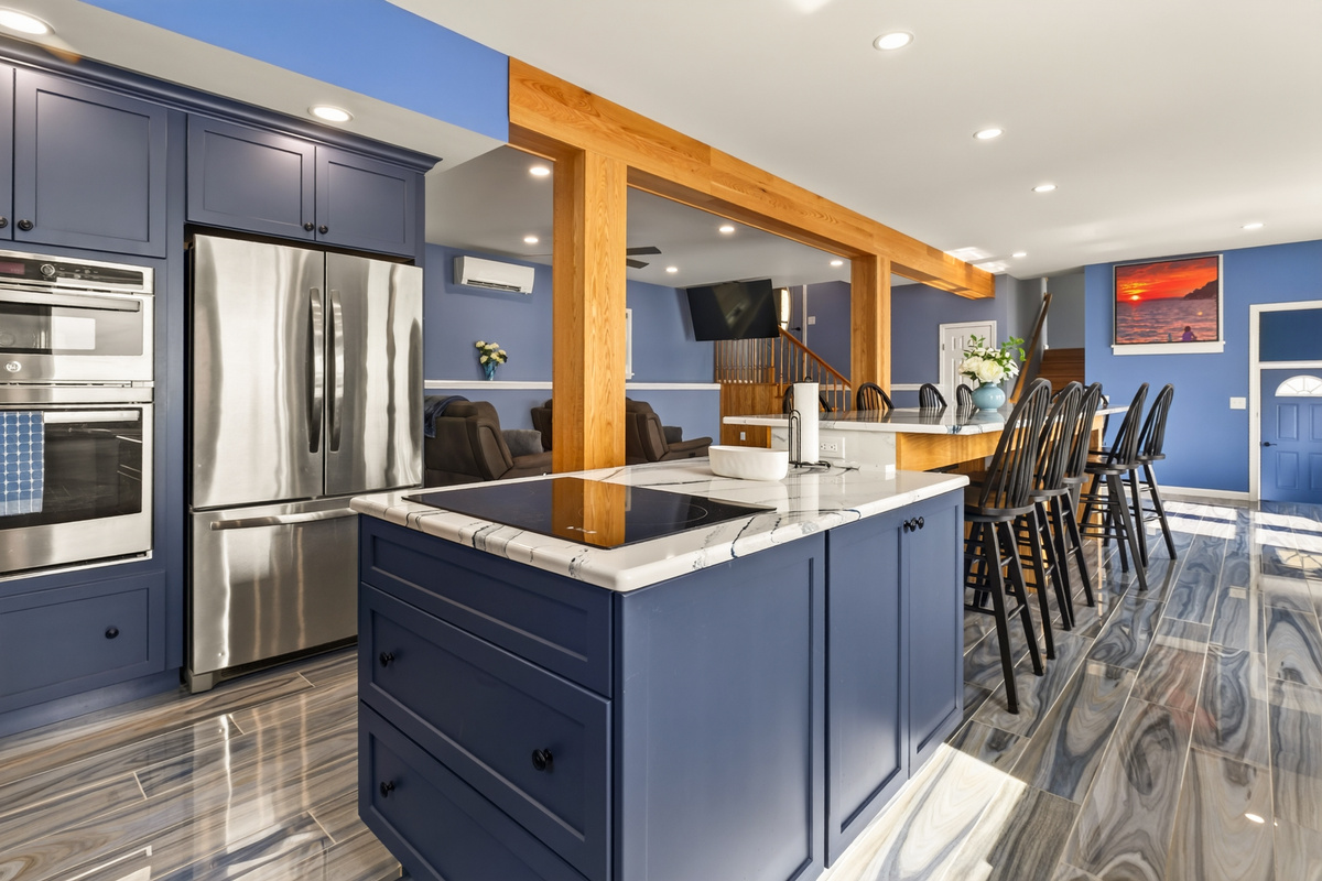 Open kitchen with central island and dining space