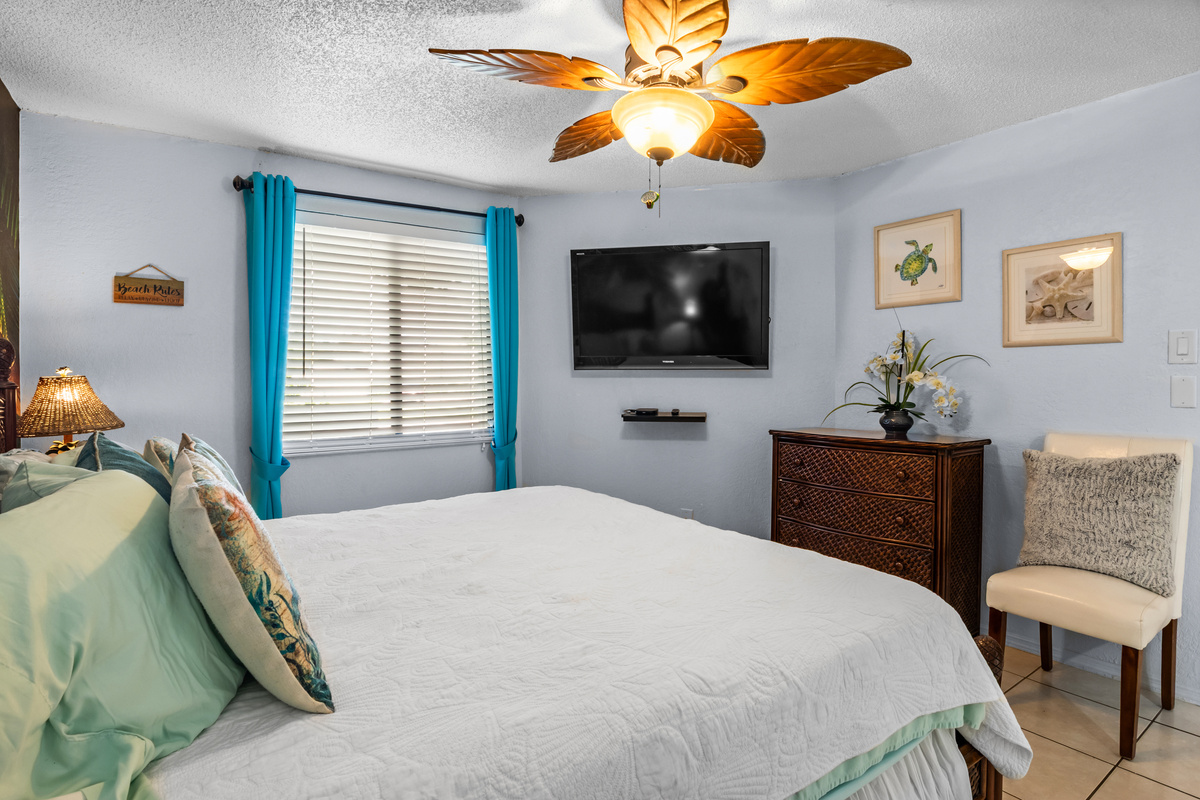 Bedroom 1. Includes a 46 inch smart TV.