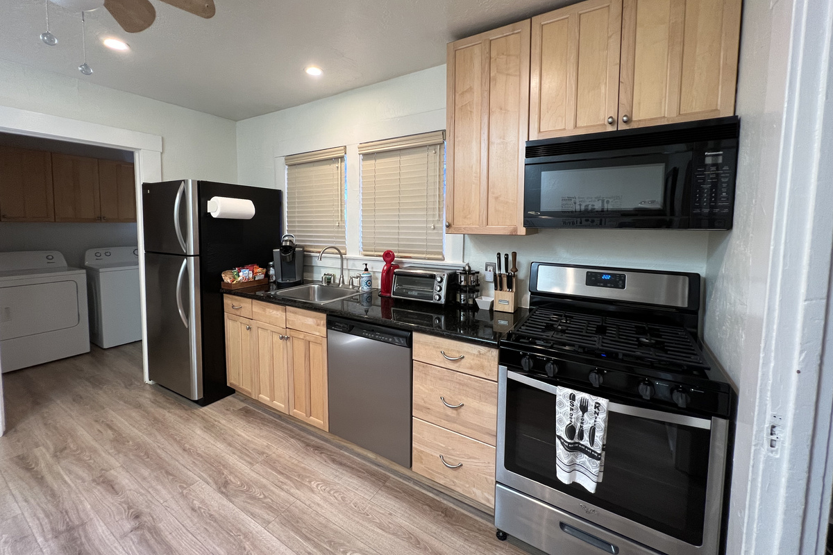 Eat in kitchen with a laundry/utility storage room