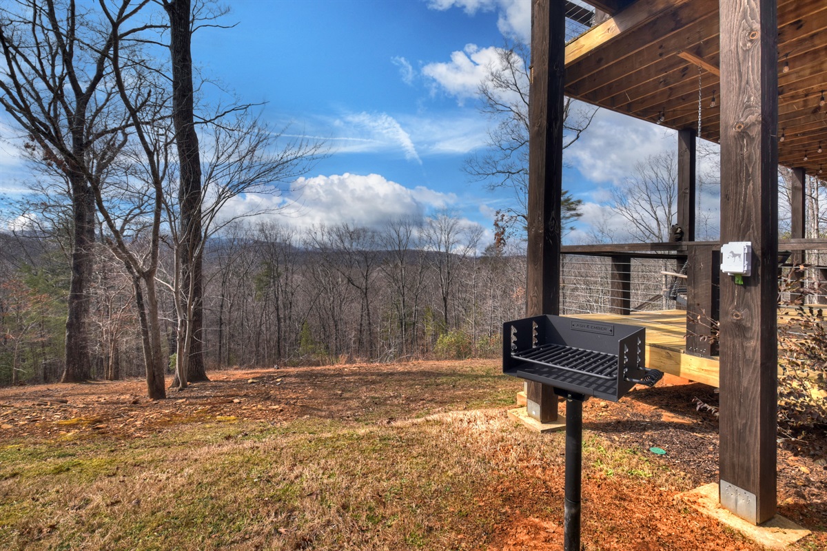 Charcoal grill next to the lower level deck