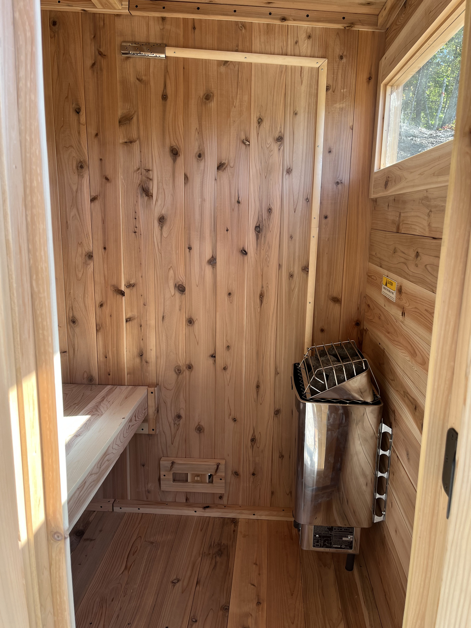 Step inside the private wood-lined sauna and unwind in a warm, relaxing space after a day of adventure.
