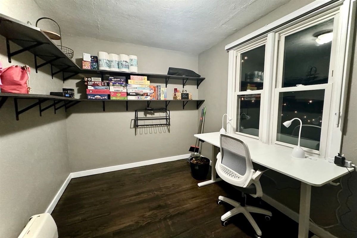 The Main Level Office and Mud Room accessible from both the Side Exterior Entrance and Dining Room offers lots of storage and an electric standing desk for your remote working needs. 