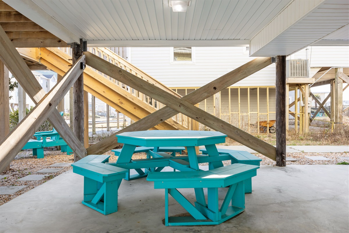 Teal picnic table perfect for casual meals or game time