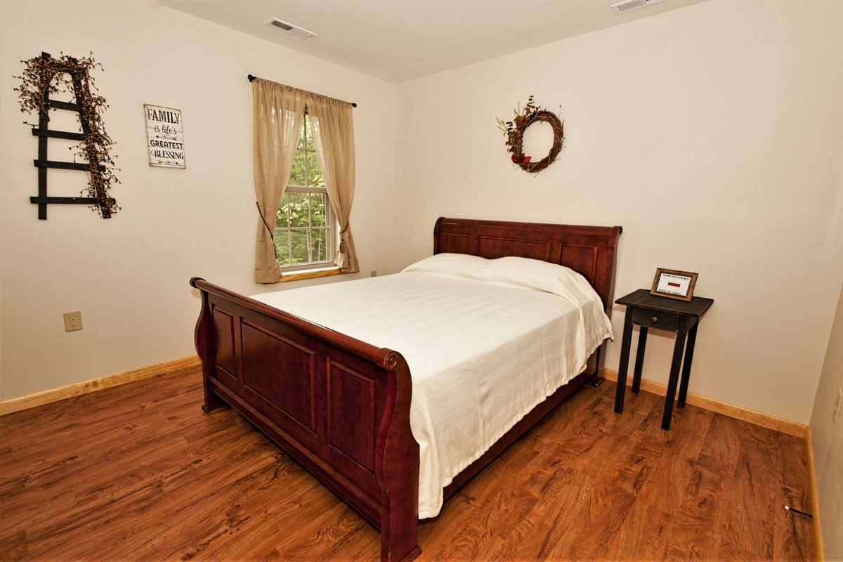 Master bedroom with a queen bed