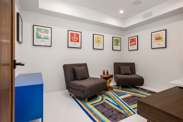 Bonus "kid's" room with 2 fold-down single beds and Vintage Nintendo, Super NES, and Xbox One.