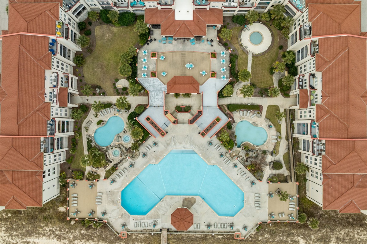 An overhead look at Villa Capriani&rsquo;s expansive pool complex