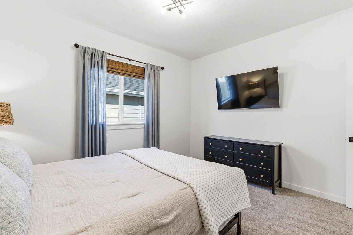 Sleep in, binge your favorite show, or simply enjoy the silence. This inviting bedroom was designed with comfort at the heart of every stay.