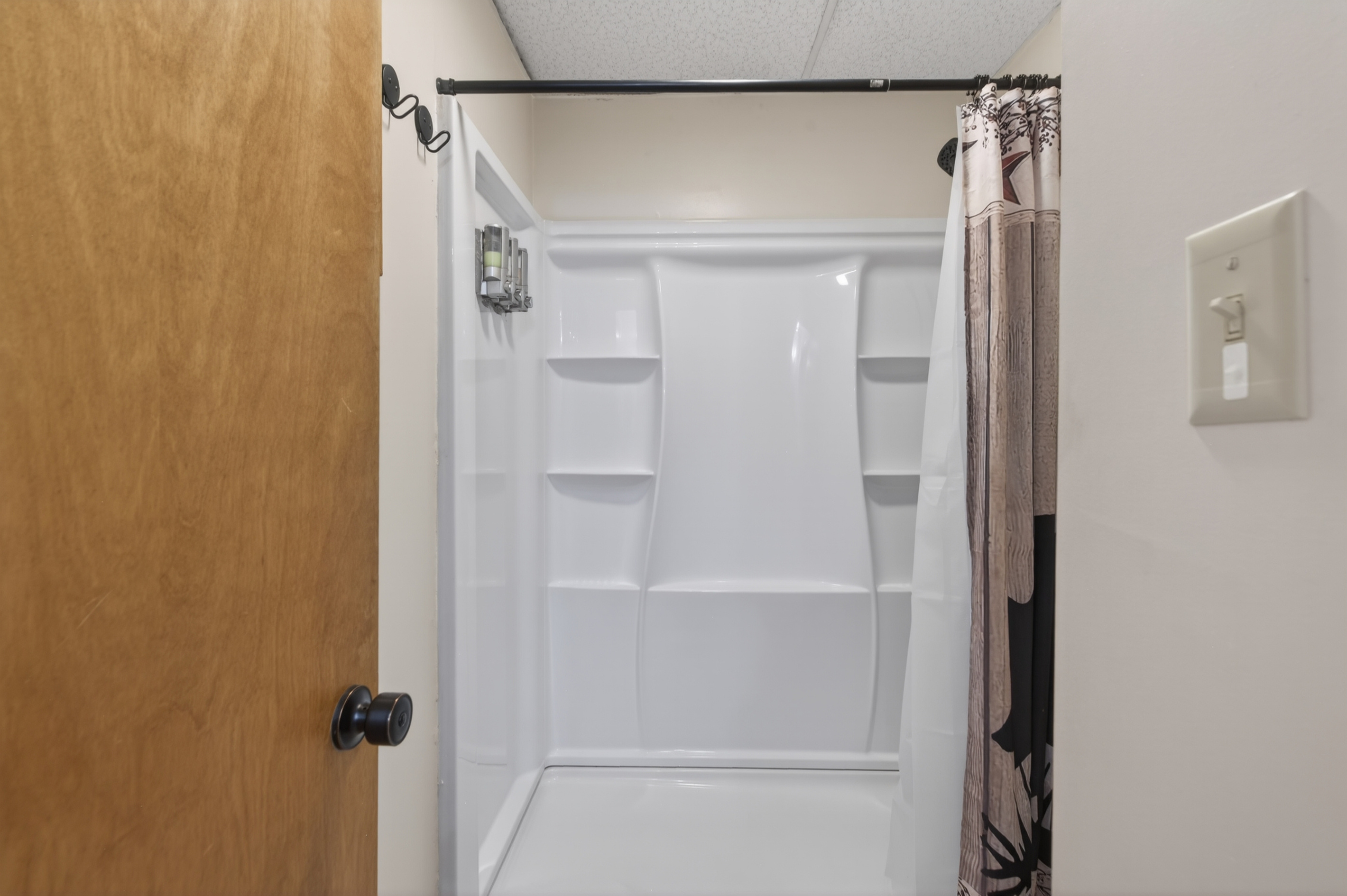 Modern Bathroom: Refresh after adventure in this sleek, bright space with ample storage!