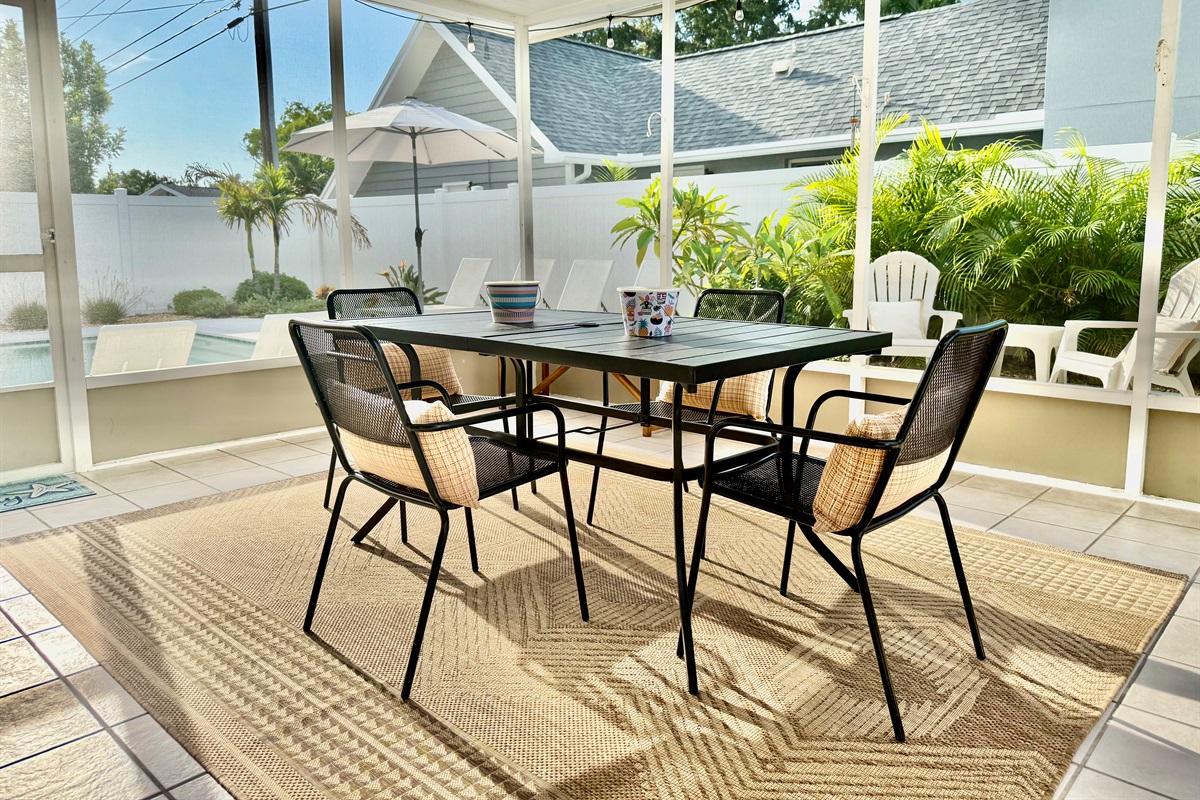 With chic patio furniture, lush greenery, and a crystal-clear heated pool, you won’t want to leave this backyard.