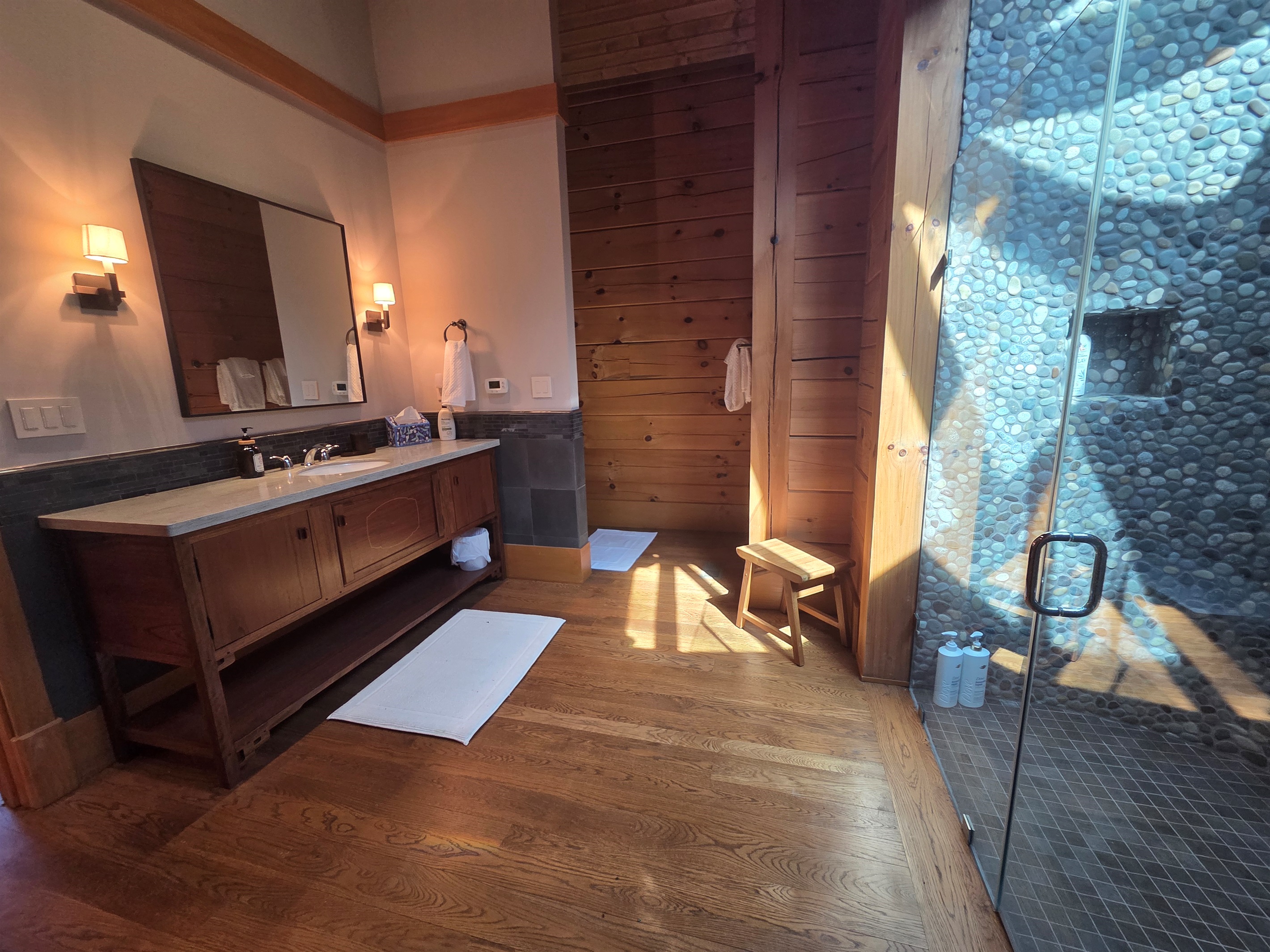 Enjoy a spa-like experience with a large walk-in shower located in the third bedroom’s bathroom.