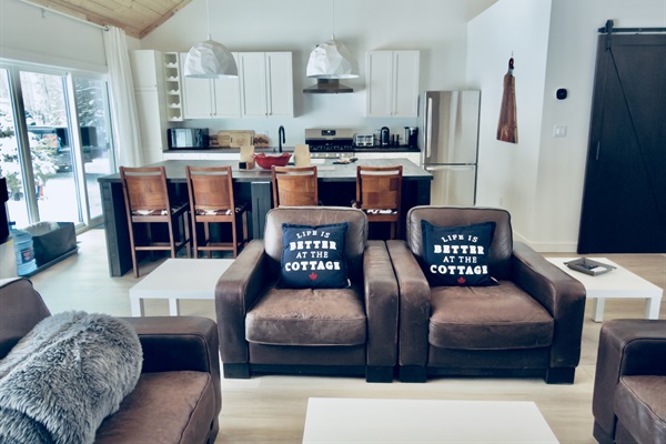 Living room seating looking toward the kitchen