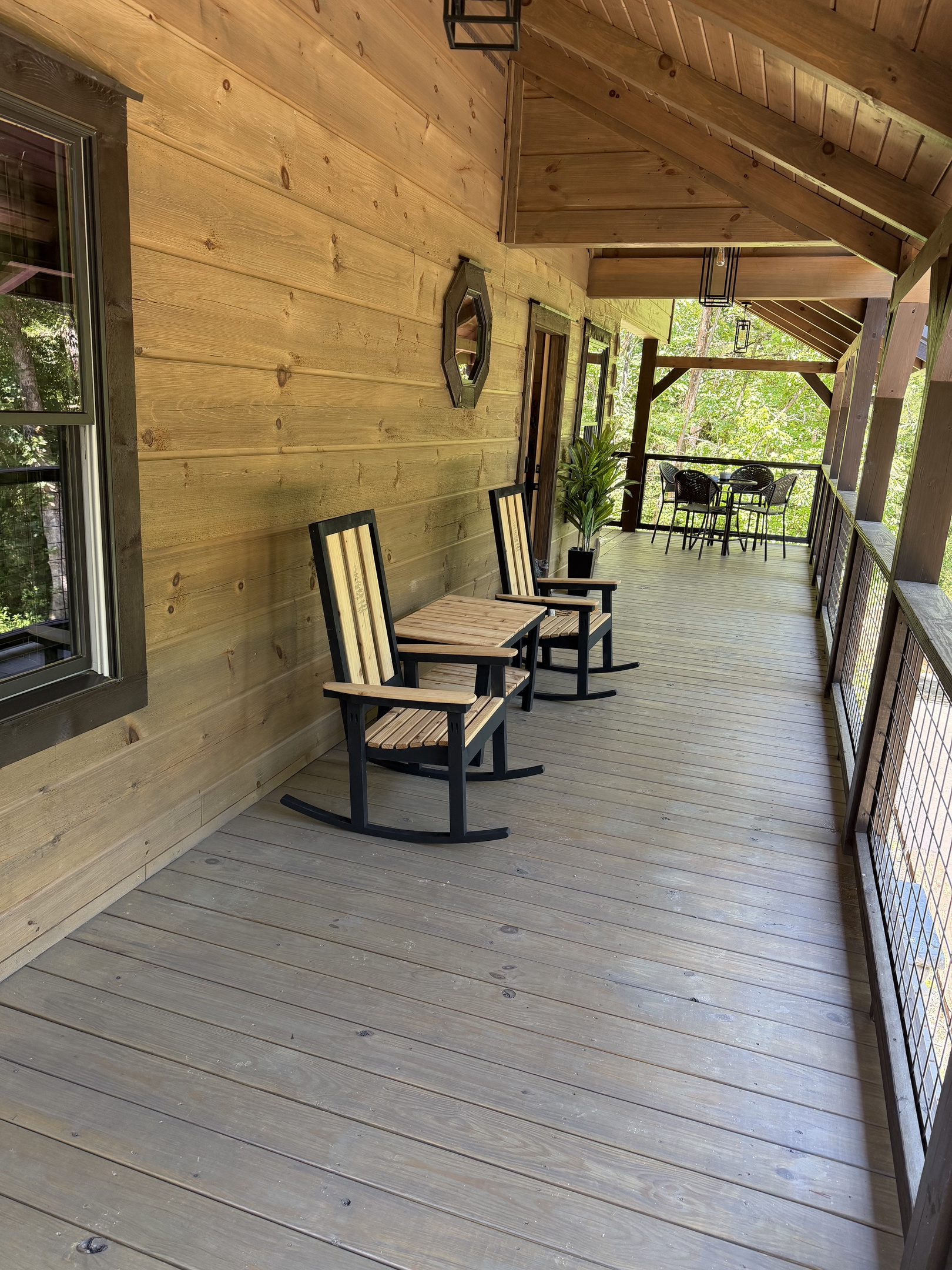 Front Deck with handmade rocking chairs and table for two