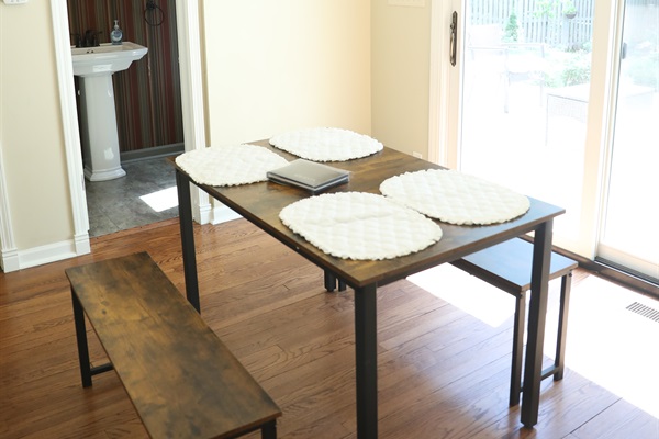 Dinette showing table and guest book, 1st Floor half bathroom